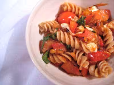pasta with fresh mozzarella, italian sausage & salad