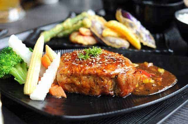 grilled bone-in pork chops meal