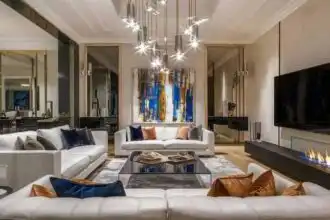 Elegant contemporary living room with stylish furniture and modern decor.