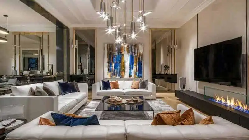 Elegant contemporary living room with stylish furniture and modern decor.