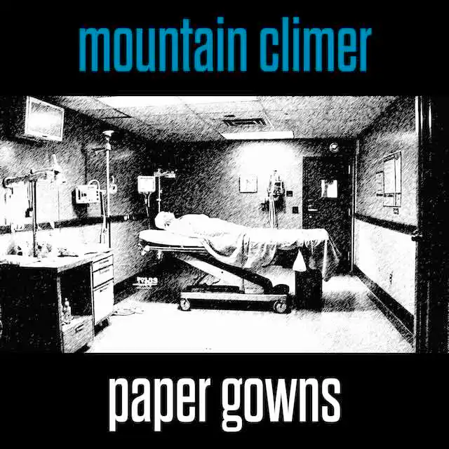 Hospital room with medical equipment and a patient bed.