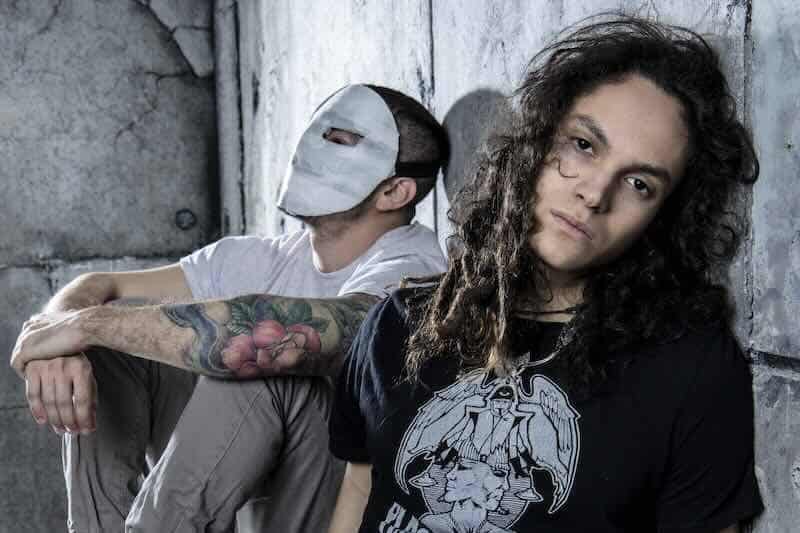 People, tattoos, urban style, grunge background, youthful fashion, alternative look.