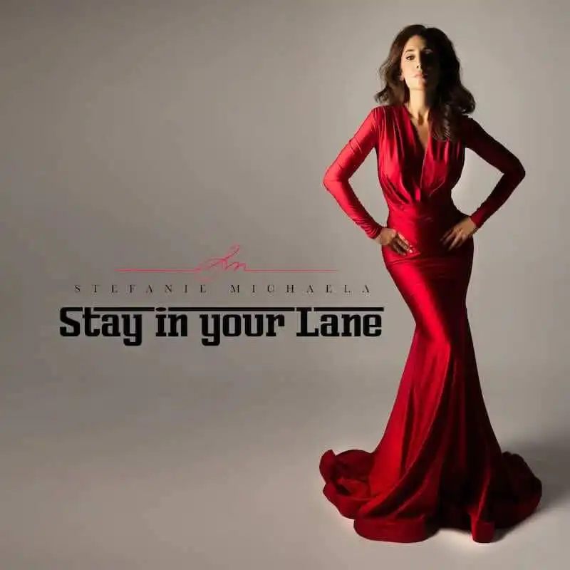 Woman in stunning red evening gown for stylish, sophisticated fashion statement.