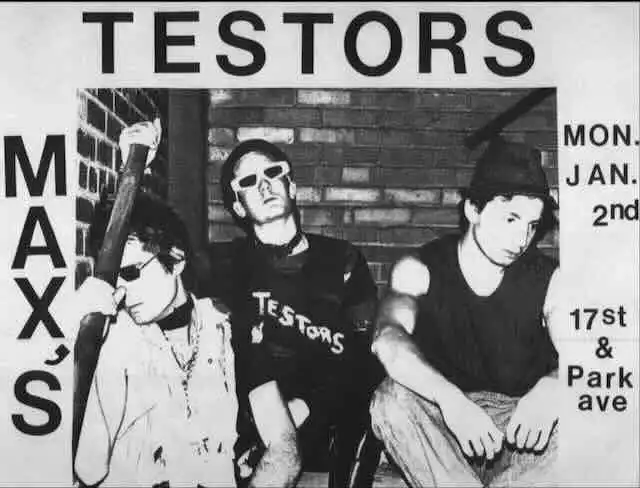 Energetic band members posing at a Max's event promoting their latest album.