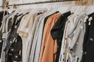 Fashion clothing display featuring casual and stylish outfits on a hanger.