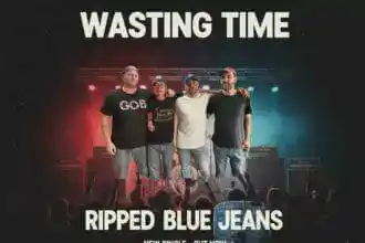wasting time ripped blue jeans