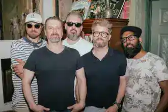 Pressgang Mutiny folk quartet performing traditional sea shanties with a modern twist.