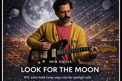 Keith Carne playing guitar with a cosmic moon background, promoting his new single "Look for the Moo.