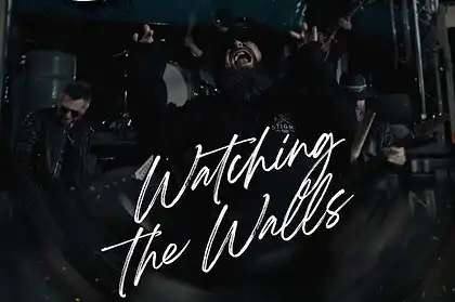 Band performing live on stage at a metal concert in the UK 2026.