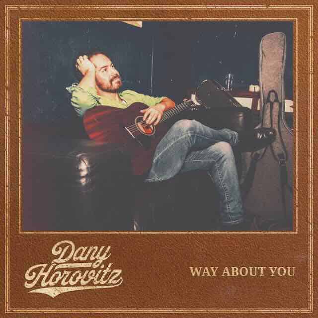 Musician Dany Horovitz relaxing with guitar on album cover for "Way About You," capturing a creative vibe.