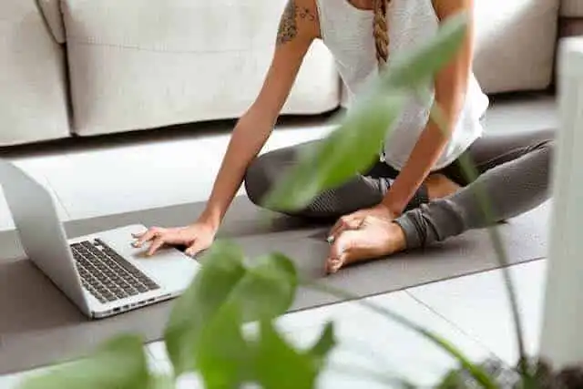 Relaxing yoga session for mental wellness and flexibility indoor.