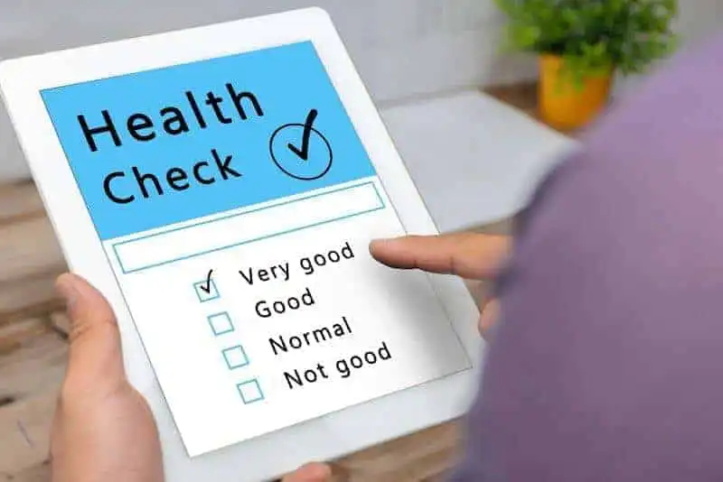 Digital health assessment on tablet for wellness screening.